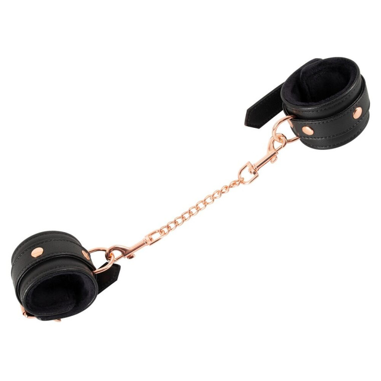 Handjárn með gylltri keðju